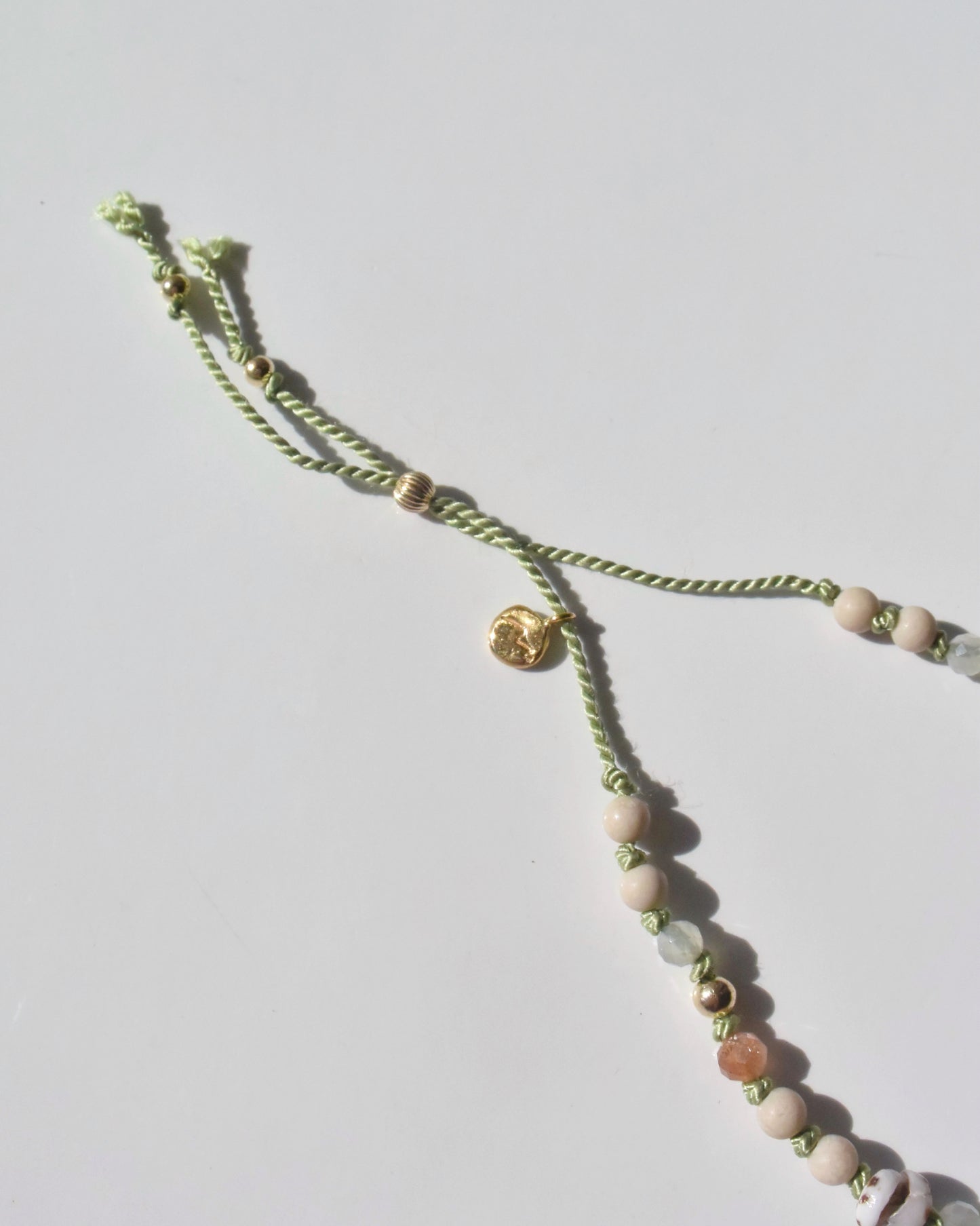 〈Silk cord bracelet〉Puka shell-Yellow green-