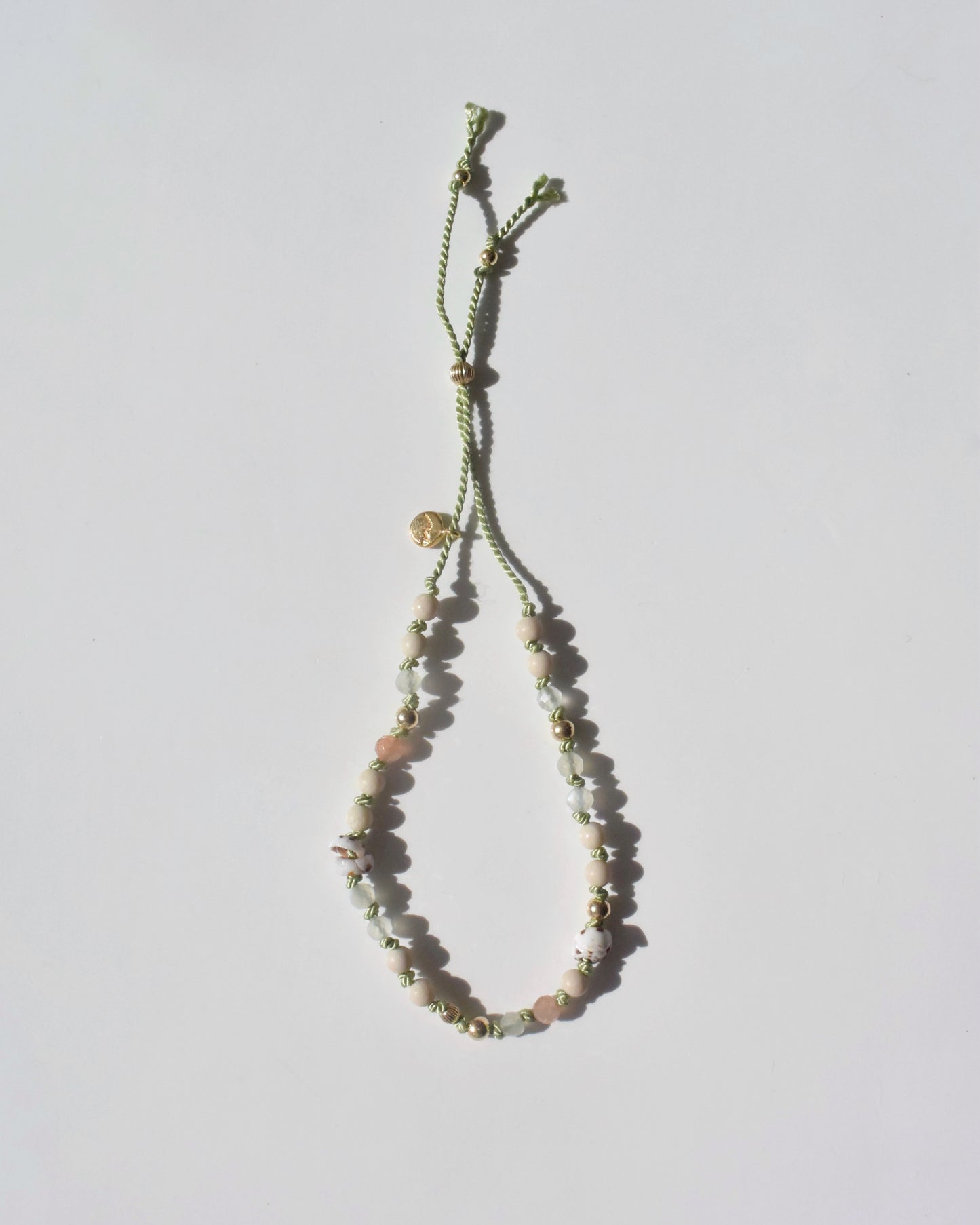 〈Silk cord bracelet〉Puka shell-Yellow green-